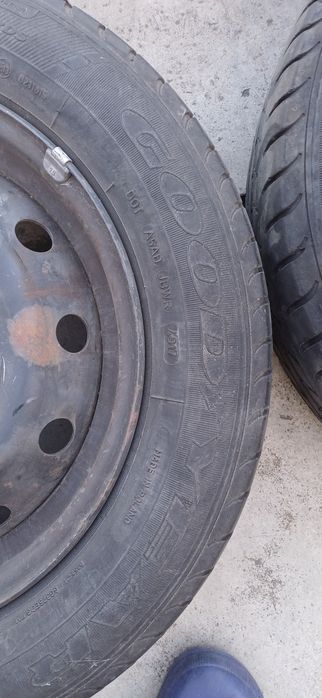 4 jante de tabla cu anvelope de vara si capace originale logan 1