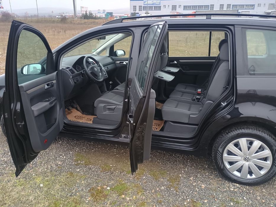 Touran 1.9.  7 locuri  An 2009