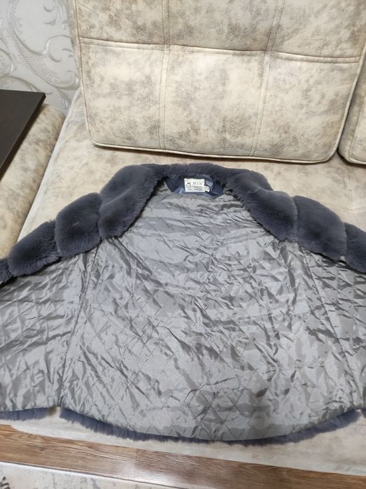 Продам меховую жилетку