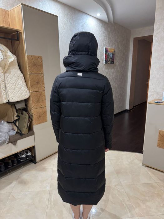 Продам пуховик зимний новый