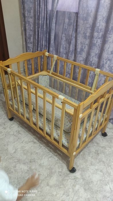 Детская кроватка с люлькой