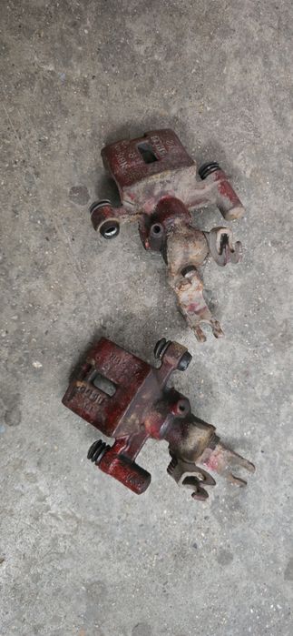 Тормозной супорт задний Мазда