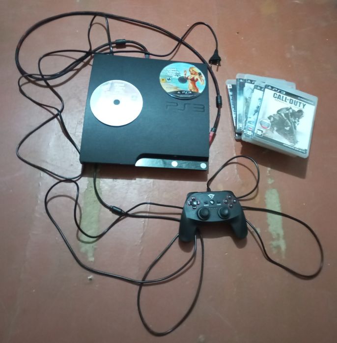 Продам прошитую приставку с дисками ps3