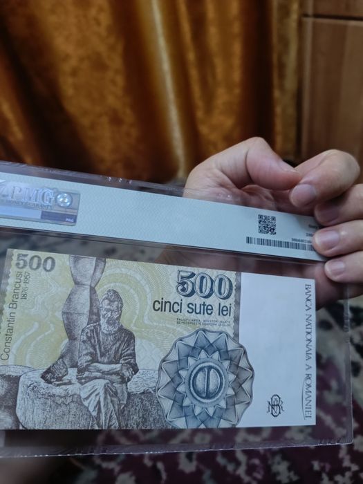 500 lei Aprilie 1991 gradată PMG 64 ,serie binară