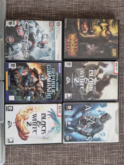 Lot 10 jocuri PC și PS3 – Assassin’s Creed, God of War, Red Dead Redemption, Star Wars