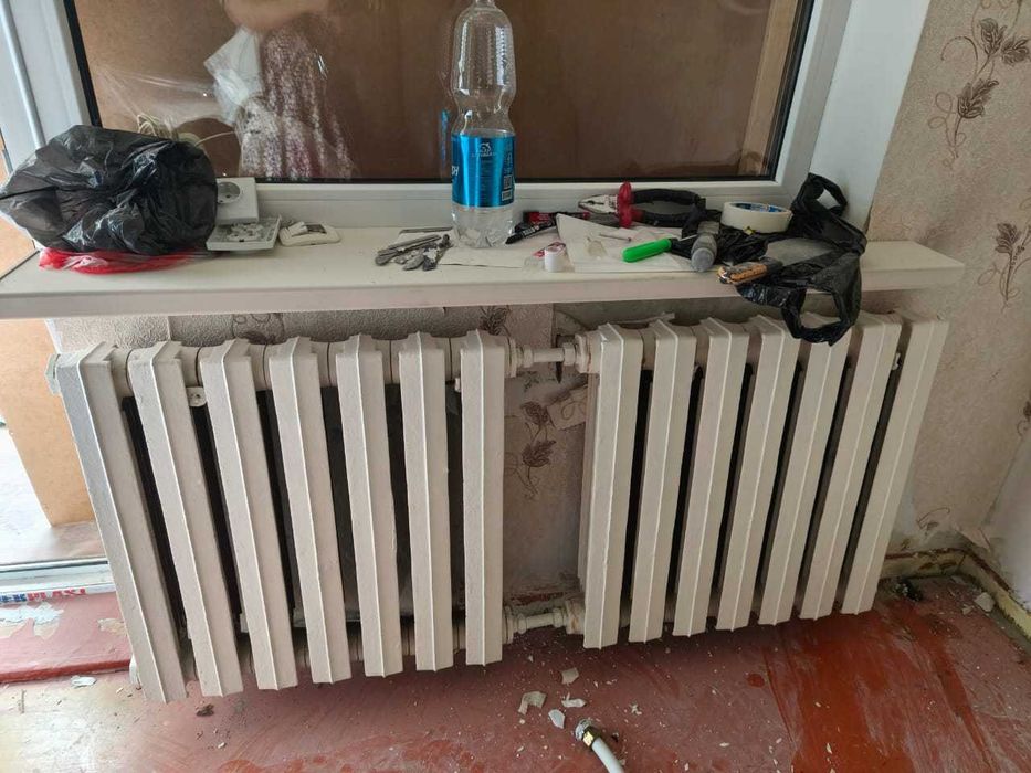 Продам 2 б/у чугунных радиатора