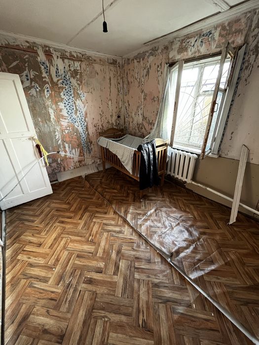 Продам дом с гаражом в бедняцком