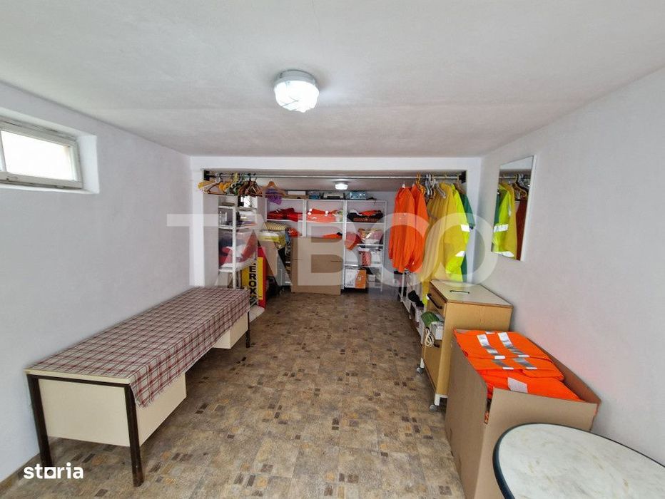 Apartament central 4 camere spatiu comercial garaj si pivnita Sibiu