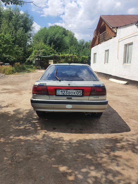 Машина Мазда 626