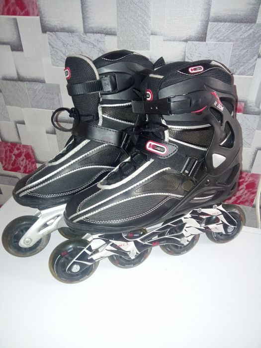 Коньки роликовые