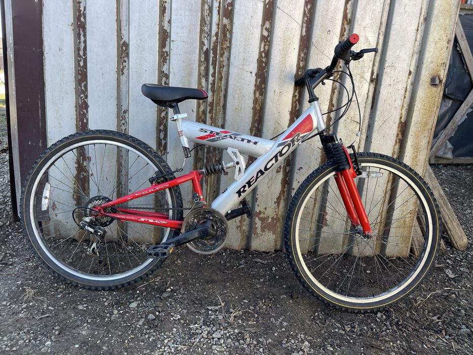 Bicicleta reactor cu suspensii roti 26”