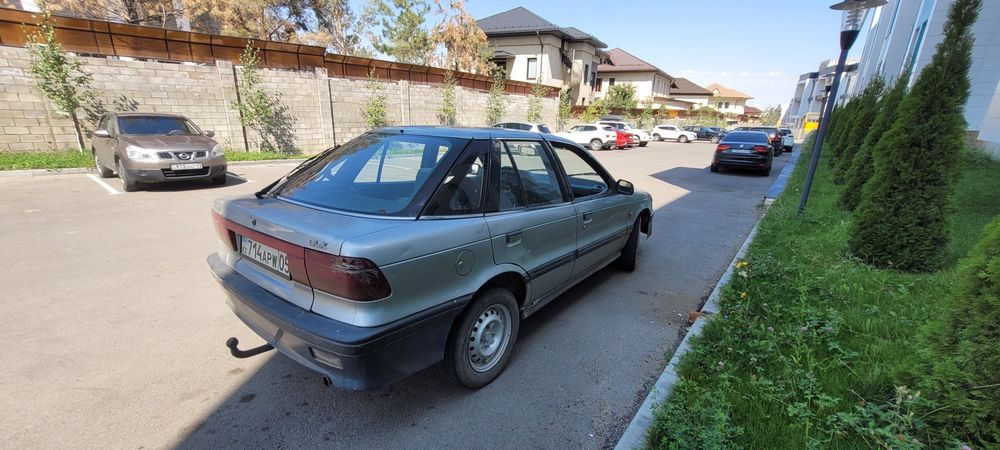 машина Mitsbishi Lancer