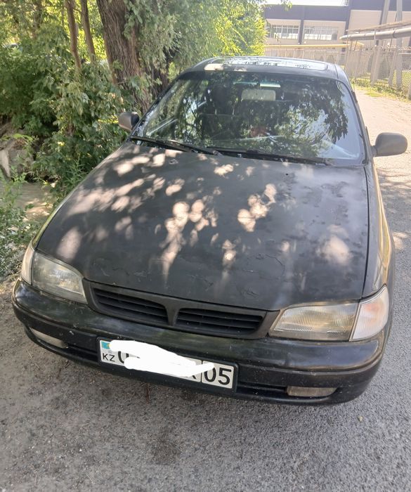 Продам  тайоту  карину е 1993г 2куб