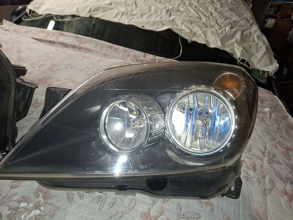 Opel astra h фарове  КОМПЛЕКТ GM Hella