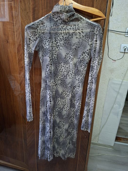 Костюм новый турецкий.  Размер 40. А также платья на 46 размер