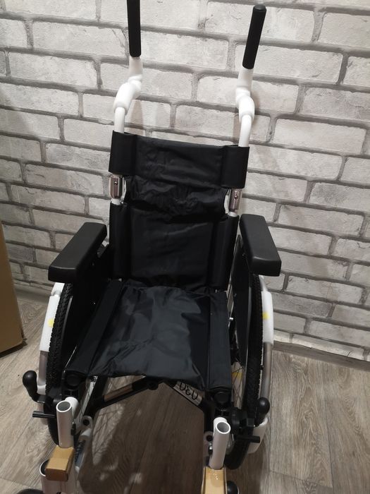 Инвалидная детская коляска