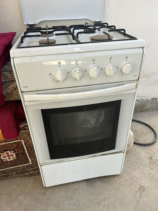 Газовая плита .