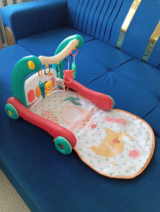 Продам толокар или коврик для малыша