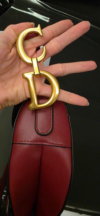 Authentic Dior Saddle bag in burgundy color