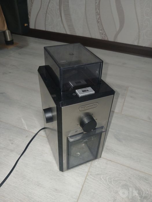 Продам кофемолку Delonghi