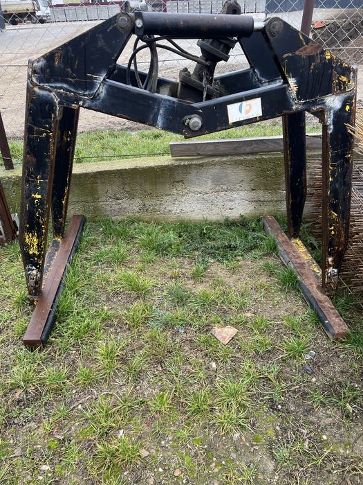 Cupa buldoexcavator komatsu graifer cu cap rotativ