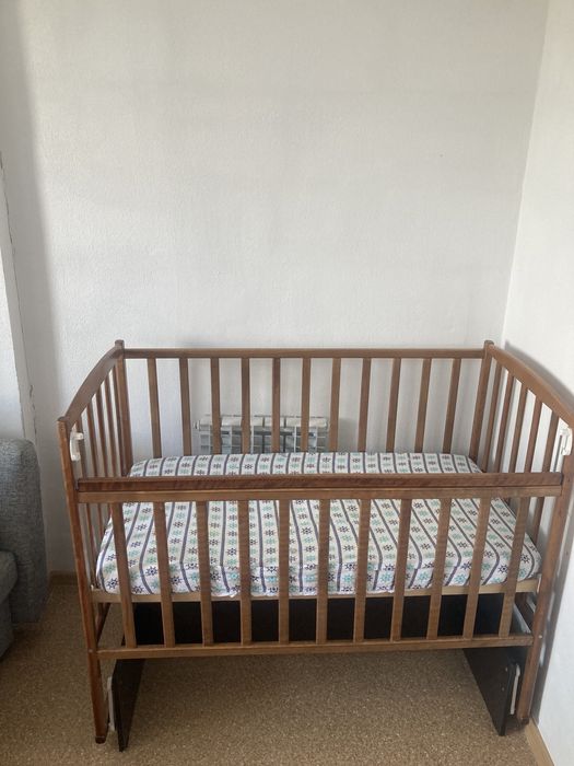 Детская кроватка маятник
