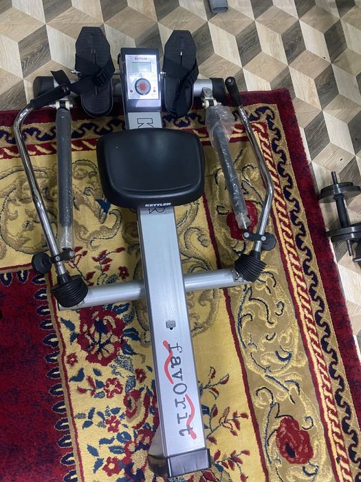 Спортивный силовой и гребной тренажер