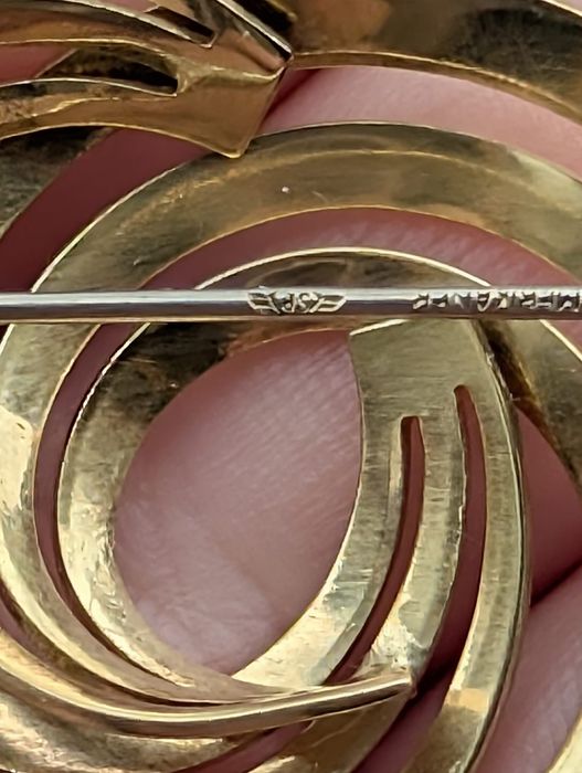 Veche brose placata cu aur, Amerikaner