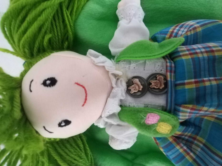 Rucsac cu o papusa aplicata