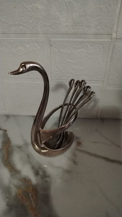 Лебедь покрытый серебром