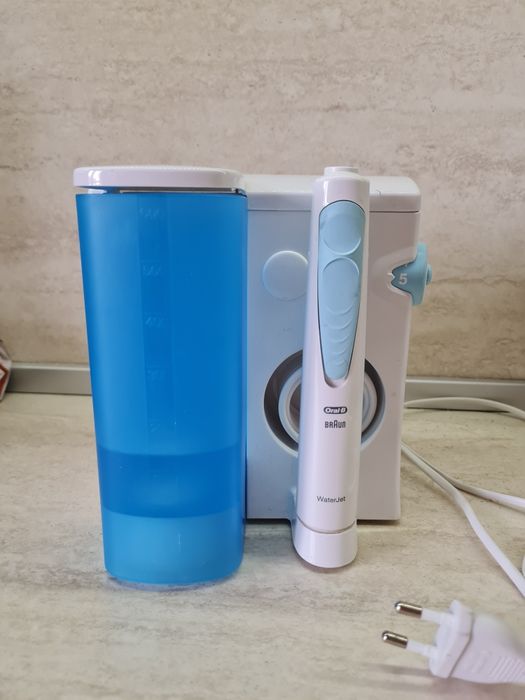 Braun water jet система за почистване на зъби