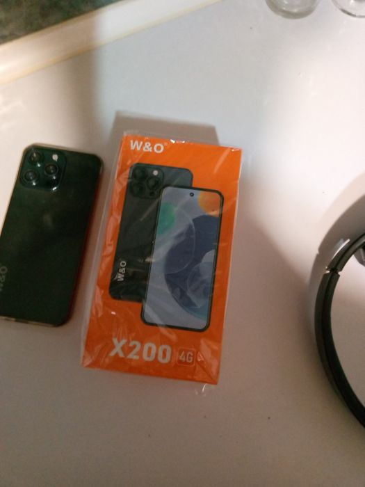 Продам телефон x200