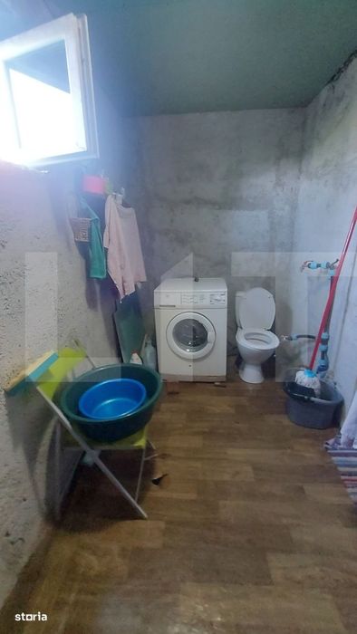 Casa cocheta din lemn masiv cu teren si livada – liniste, natura si