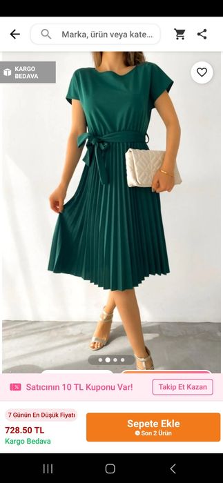 Новое турецкое зеленое платье ниже колен.