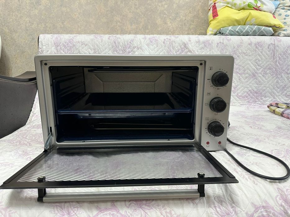 Продам духовку новая