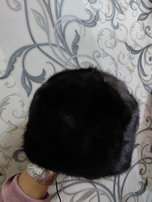 новыи норкавая шапка не одевала