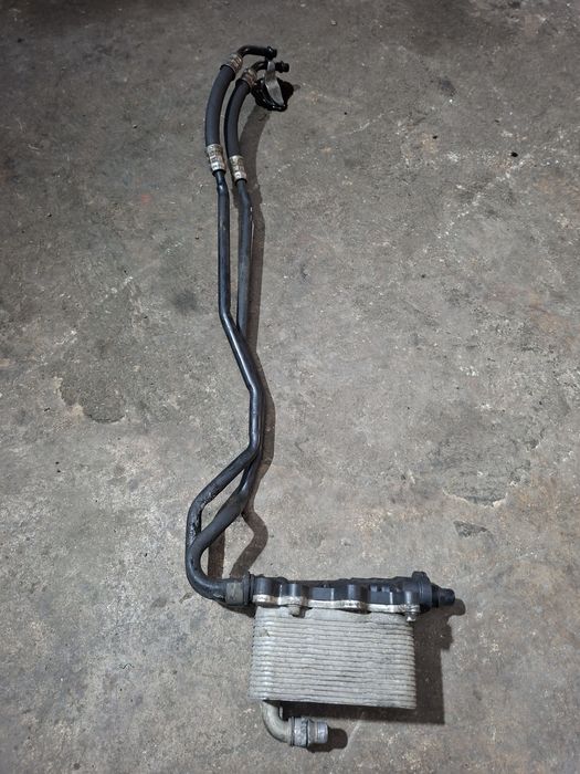 Termoflot răcitor ulei cutie BMW E60 E61 E63 E64 E65 E83 Cod 7803830