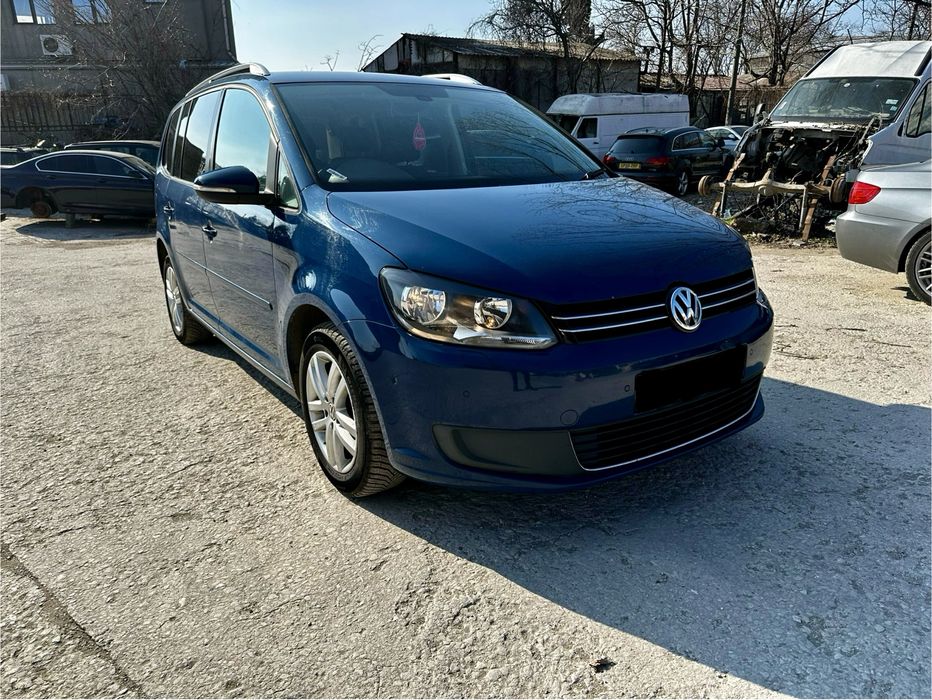 VW Touran 2.0TDI Bluemotion 2012г Фолксваген  Туран 140кс