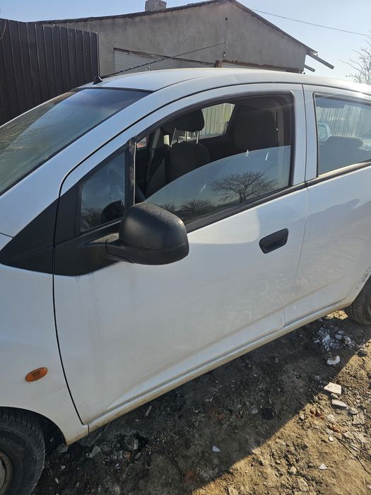Dezmembrez  Chevrolet spark 2012 piese motor cutie uși haion aripi