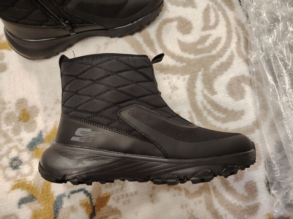 Продам новые дутики ботинки