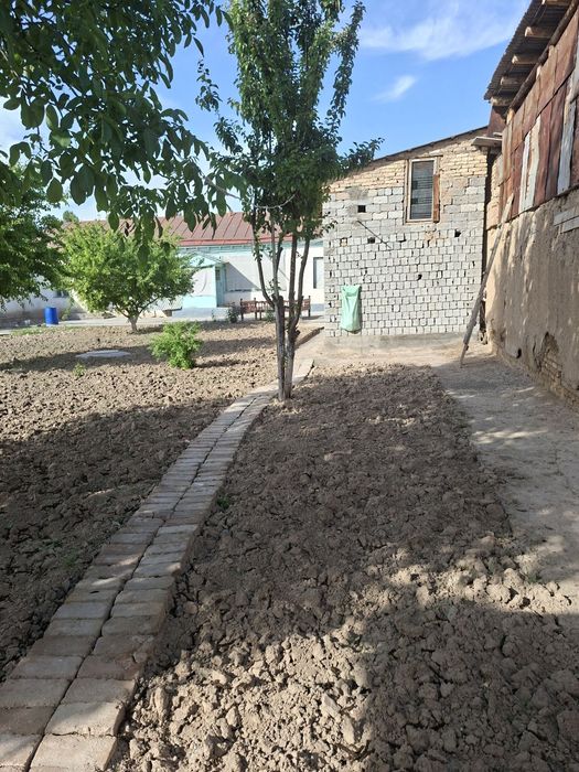 # Тезкор! Йул юзидан 12 соток ер сотувда.Кибрай,Аргин .Фасади - 25 м.