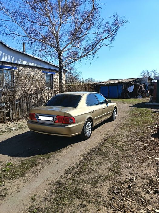 Продам машину KIA OPTIMA 2004 года.