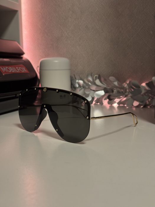 Vand ochelarii Gucci