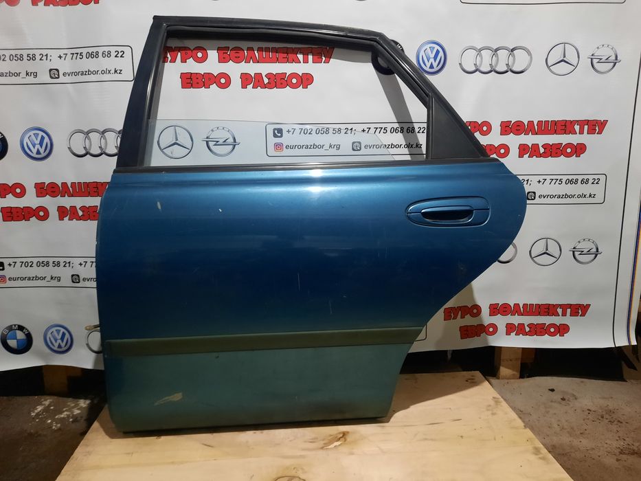 Двери на Мазду Кронос