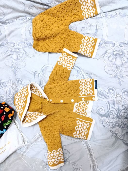 Теплые одежды для малышей