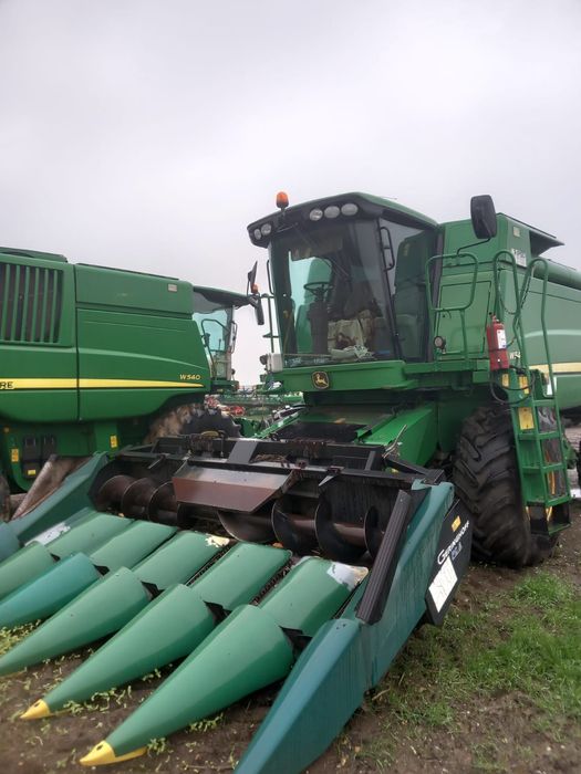vând combina John Deere W540