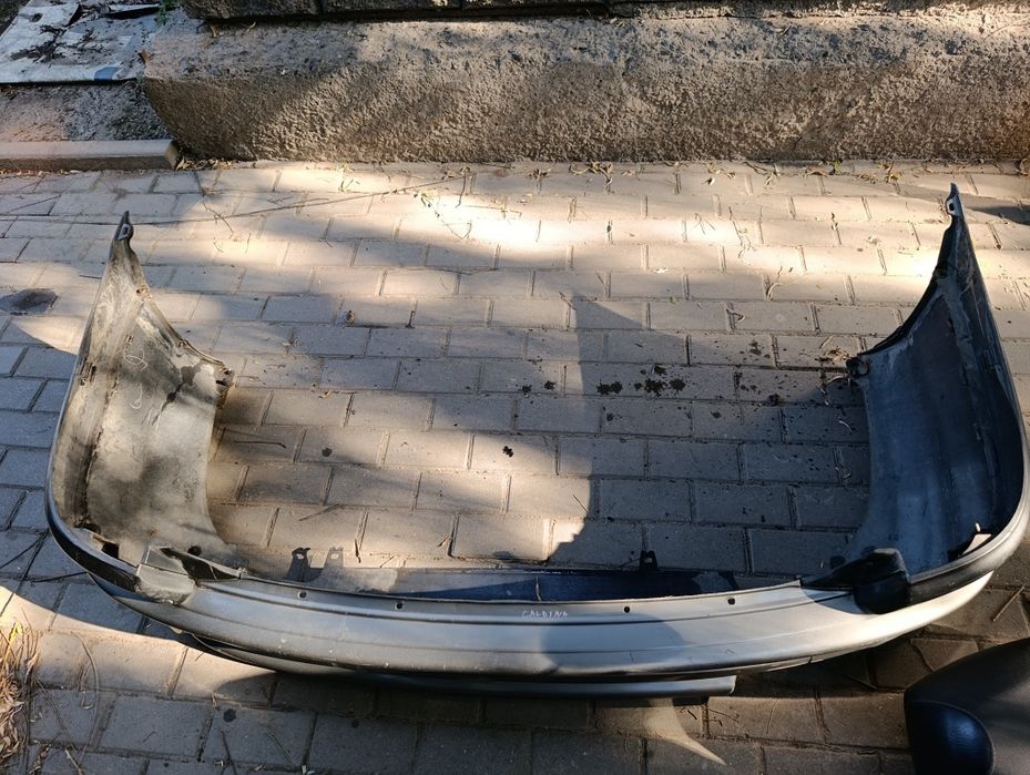 Задний бампер toyota caldina