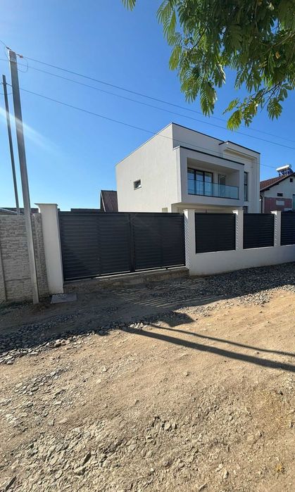 Casă modernă de vânzare - calitate premium, toate utilitatile