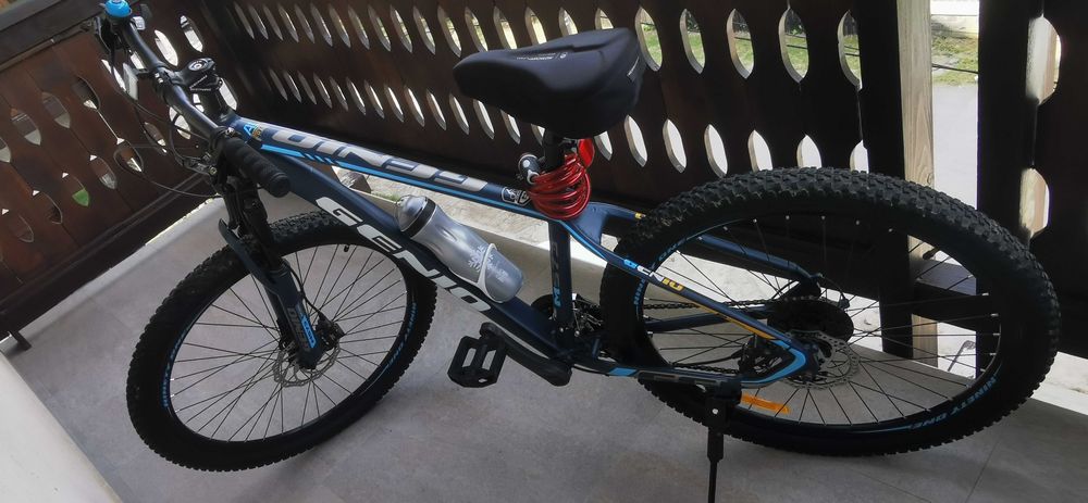 Bicicletă MTB Genio M573 27.5" – Ca Nouă + Pachet Complet Accesorii Cadou