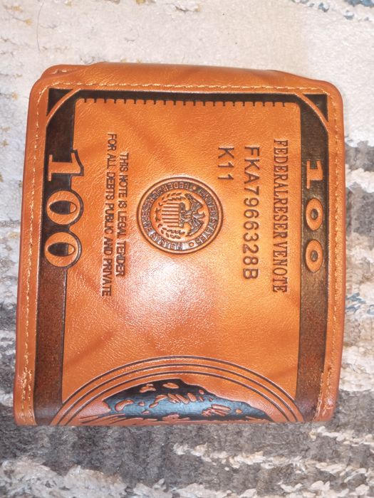 Продам Новое  партмоне с рисункок 100$